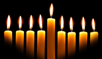 Hanukkah menorah with lit candles