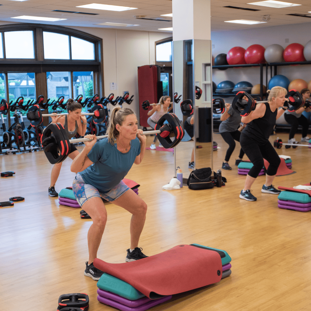 A group of people in a gym.