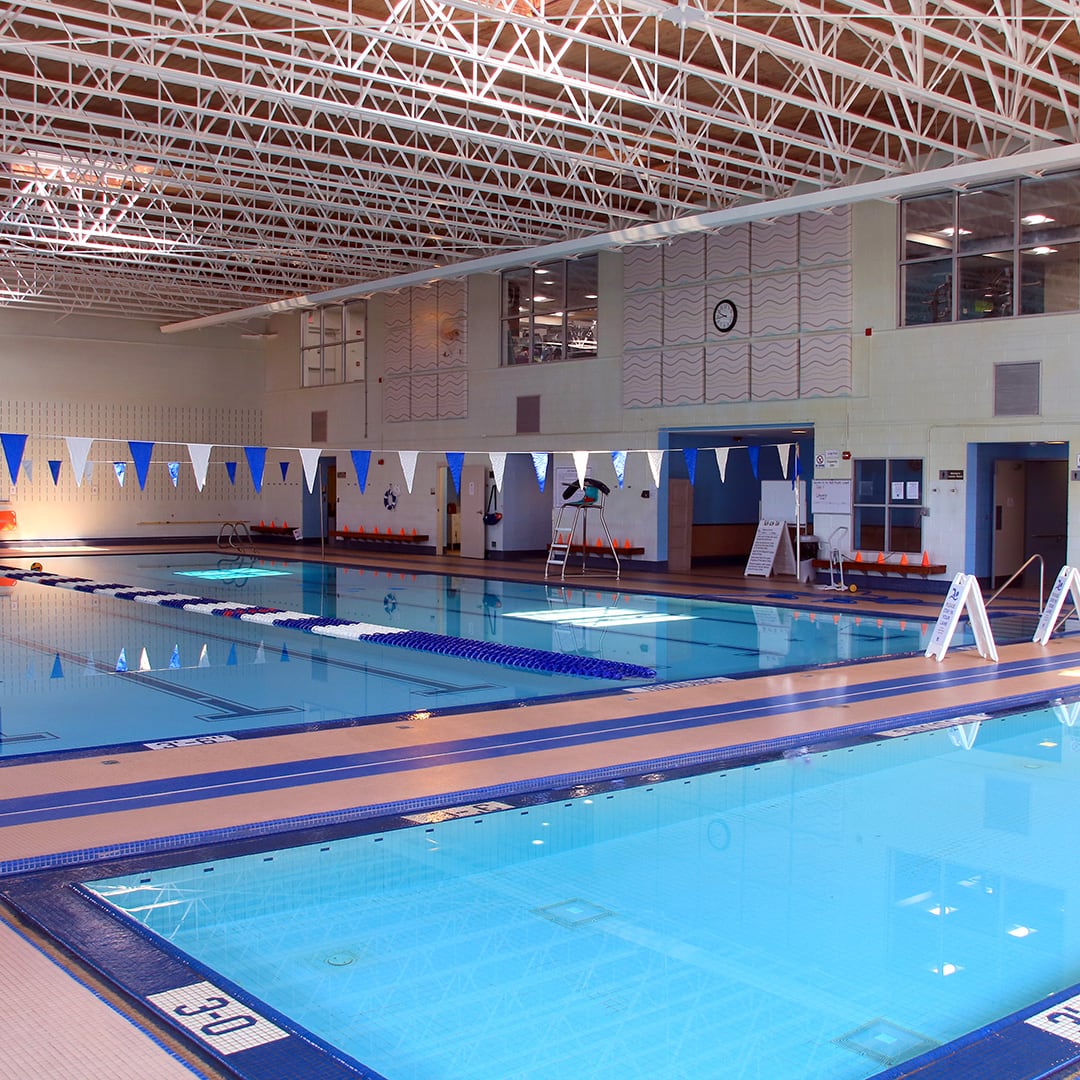 A swimming pool in a gym.